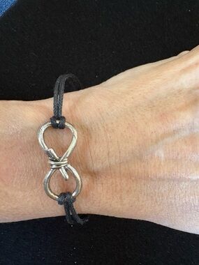 Silver Infinity Knot Bracelet with Black Cord